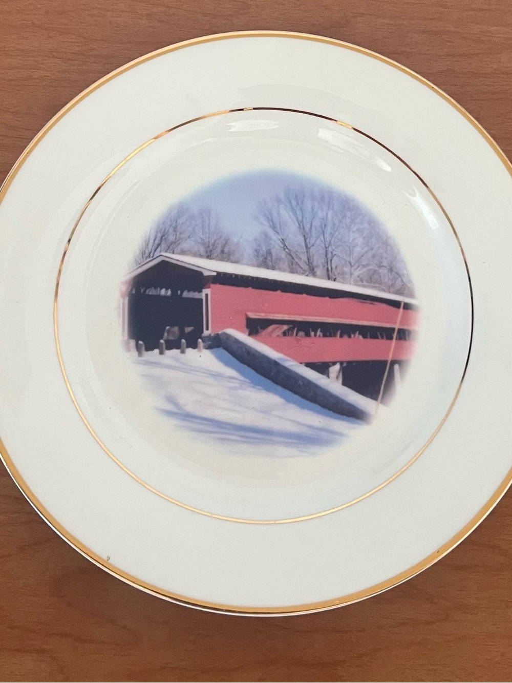 Decorative White Porcelain Plate with Red Covered Bridge Scene and Gold Trim